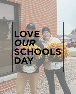 Image of people standing outside a school