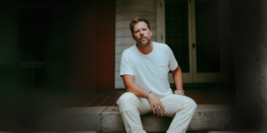 Patrick Mayberry sitting on a porch